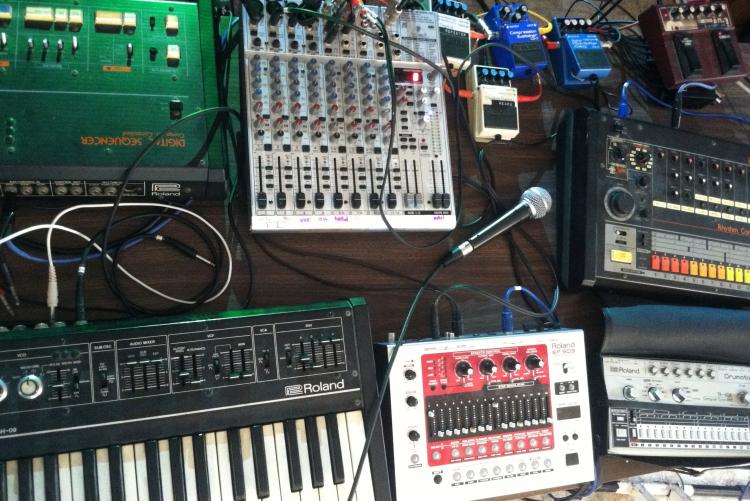 photo of synths and drum machines